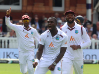 Jayden Seales of West Indies is celebrating the wicket of England's Ben Duckett, caught by Joshua Da Silva of West Indies, during the Rothes...