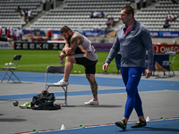 PARIS, FRANCE - JULY 08:
(L-R) Wojciech NOWICKI and Pawel FAJDEK, both Poland, compete in the Men's Hammer Throw, during the Meeting of Pari...