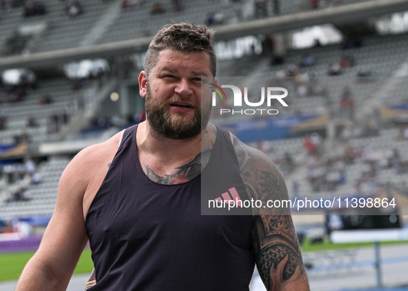 PARIS, FRANCE - JULY 08:
Pawel FAJDEK of Poland, competes in the Men's Hammer Throw, during the Meeting of Paris 2024 - IAAF Diamond League,...