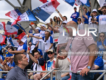 PARIS, FRANCE - JULY 08:
Piotr Malachowski (R), a Polish retired discus thrower, chatting with Wojciech NOWICKI (L), during the Men's Hammer...