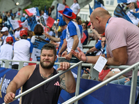 PARIS, FRANCE - JULY 08:
Piotr Malachowski (R), a Polish retired discus thrower, chatting with Pawel FAJDEK (L), during the Men's Hammer Thr...