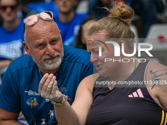 PARIS, FRANCE - JULY 08:
Alexandra TAVERNIER of France, with her father and coach, Christophe TAVERNIER, during the Women's Hammer Throw, at...