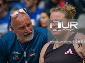 PARIS, FRANCE - JULY 08:
Alexandra TAVERNIER of France, with her father and coach, Christophe TAVERNIER, during the Women's Hammer Throw, at...