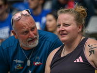 PARIS, FRANCE - JULY 08:
Alexandra TAVERNIER of France, with her father and coach, Christophe TAVERNIER, during the Women's Hammer Throw, at...