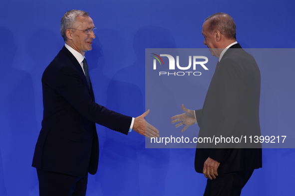 Secretary General of NATO Jens Stoltenberg and President of Turkiye Recep Tayyip Erdogan during welcome ceremony of the NATO Summit in Washi...