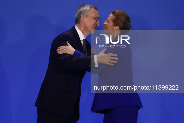 Secretary General of NATO Jens Stoltenberg and Prime Minister of Denmark Mette Frederiksen during welcome ceremony of the NATO Summit in Was...