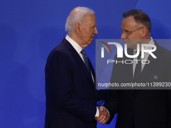 President of the United States Joe Biden and President of Poland Andrzej Duda during welcome ceremony of the NATO Summit in Washington DC, U...