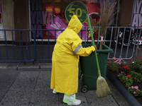 A person is walking in the rain on the streets of Mexico City, Mexico, on june 10, 2024. (