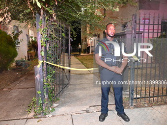 A police officer is standing guard at the crime scene. One person is shot and killed in Washington, D.C., United States, on July 10, 2024. O...