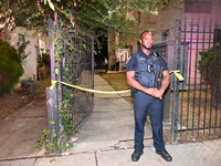 A police officer is standing guard at the crime scene. One person is shot and killed in Washington, D.C., United States, on July 10, 2024. O...