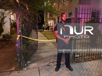 A police officer is standing watch at the crime scene. One person is shot and killed in Washington, D.C., United States, on July 10, 2024. O...