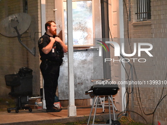 A police officer is overlooking the crime scene. One person is shot and killed in Washington, D.C., United States, on July 10, 2024. On Wedn...