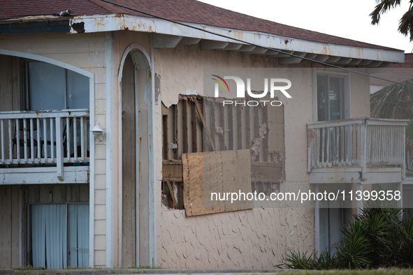 Damage is being seen on a building in Galveston, Texas, on July 10, 2024. 