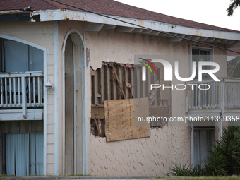 Damage is being seen on a building in Galveston, Texas, on July 10, 2024. (