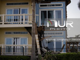 Damage is being seen on a building in Galveston, Texas, on July 10, 2024. (