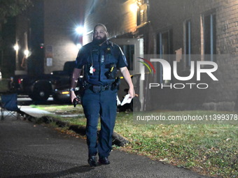 A police officer is at the crime scene. One adult male is injured in a shooting in Washington, D.C., United States, on July 10, 2024. On Wed...