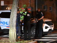 Police officers are on the scene. One adult male is injured in a shooting in Washington, D.C., United States, on July 10, 2024. Wednesday ev...