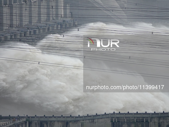 Floodwater is being released from the Three Gorges Dam in Yichang, China, on July 11, 2024. 