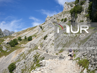 The Cares Trail (Ruta del Cares) in Asturias, Spain, on July 11, 2024, is one of the most popular trekking paths within the Picos de Europa....