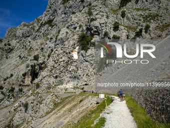 The Cares Trail (Ruta del Cares) in Asturias, Spain, on July 11, 2024, is one of the most popular trekking paths within the Picos de Europa....