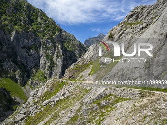 The Cares Trail (Ruta del Cares) in Asturias, Spain, on July 11, 2024, is one of the most popular trekking paths within the Picos de Europa....