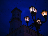 A lamppost is shining near the Lviv Town Hall at night in Lviv, Ukraine, on July 5, 2024. NO USE RUSSIA. NO USE BELARUS. (