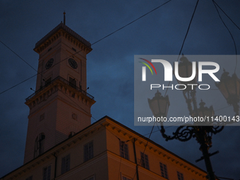 The Lviv Town Hall is being pictured during a power outage at night in Lviv, Ukraine, on July 5, 2024. NO USE RUSSIA. NO USE BELARUS. (