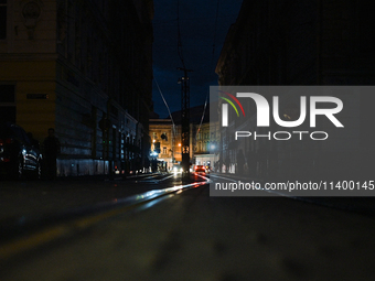 Tram tracks are passing through Katedralna Square at night in Lviv, Ukraine, on July 5, 2024. NO USE RUSSIA. NO USE BELARUS. (