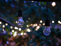 Light bulbs are being used as part of string lights at an outdoor cafe in Lviv, Ukraine, on July 5, 2024. NO USE RUSSIA. NO USE BELARUS. (