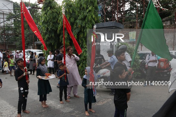 A Muslim devotee is participating in the 4th day of the Muharram festival in Kolkata, India, on July 11, 2024. 