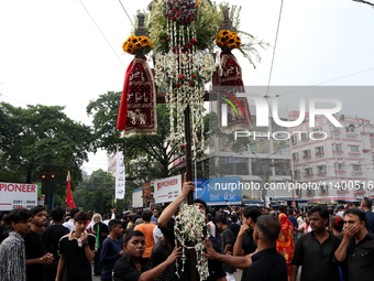 A Muslim devotee is participating in the 4th day of the Muharram festival in Kolkata, India, on July 11, 2024. (