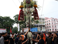 A Muslim devotee is participating in the 4th day of the Muharram festival in Kolkata, India, on July 11, 2024. (