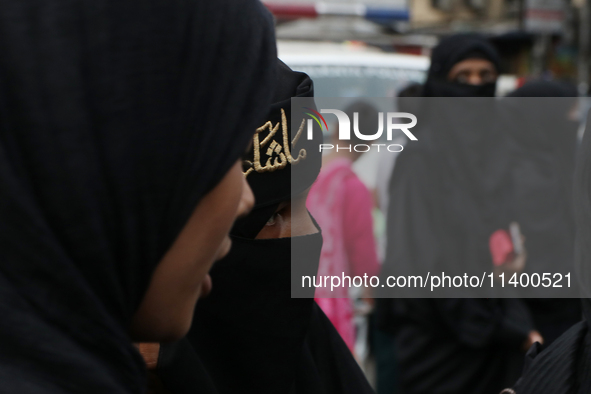 A Muslim devotee is participating in the 4th day of the Muharram festival in Kolkata, India, on July 11, 2024. 