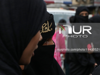 A Muslim devotee is participating in the 4th day of the Muharram festival in Kolkata, India, on July 11, 2024. (