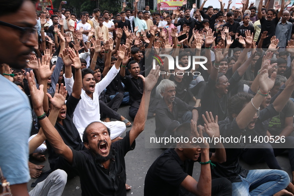 A Muslim devotee is participating in the 4th day of the Muharram festival in Kolkata, India, on July 11, 2024. 