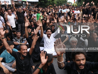 A Muslim devotee is participating in the 4th day of the Muharram festival in Kolkata, India, on July 11, 2024. (