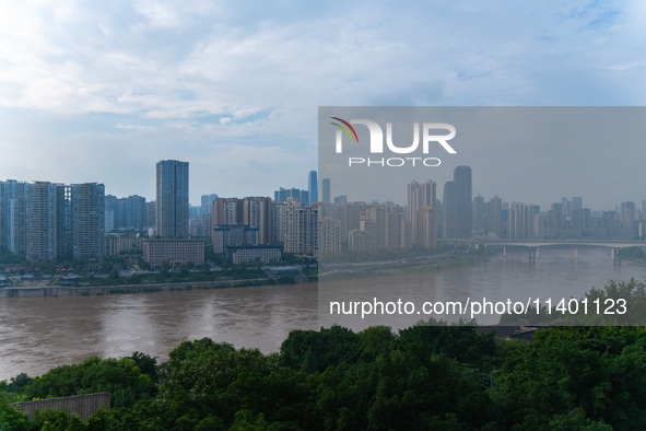 Water levels of the Jialing River and Yangtze River are rising sharply after heavy rainfall in Chongqing, China, on July 11, 2024. It is rep...