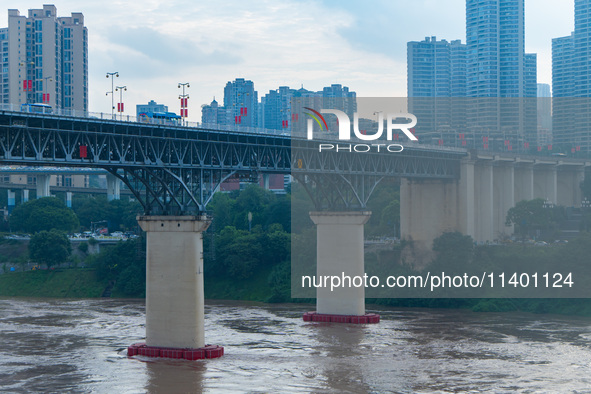 Water levels of the Jialing River and Yangtze River are rising sharply after heavy rainfall in Chongqing, China, on July 11, 2024. It is rep...