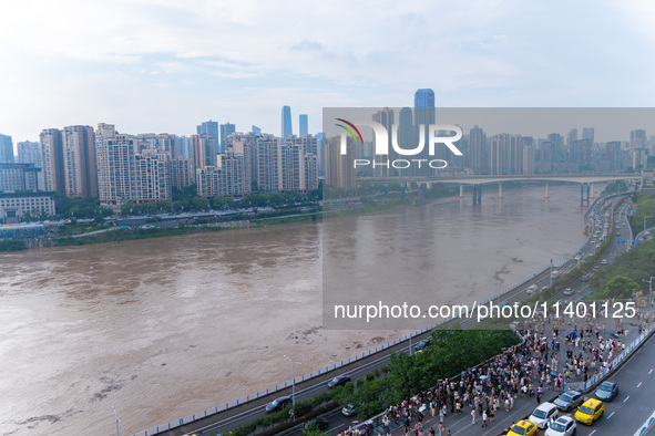 Water levels of the Jialing River and Yangtze River are rising sharply after heavy rainfall in Chongqing, China, on July 11, 2024. It is rep...