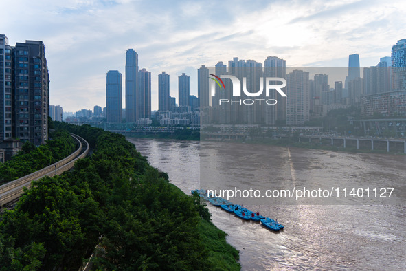 Water levels of the Jialing River and Yangtze River are rising sharply after heavy rainfall in Chongqing, China, on July 11, 2024. It is rep...