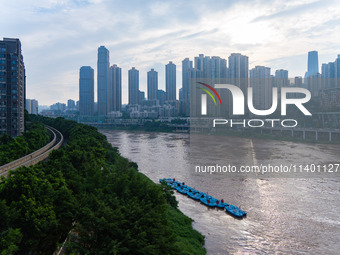 Water levels of the Jialing River and Yangtze River are rising sharply after heavy rainfall in Chongqing, China, on July 11, 2024. It is rep...