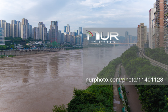 Water levels of the Jialing River and Yangtze River are rising sharply after heavy rainfall in Chongqing, China, on July 11, 2024. It is rep...