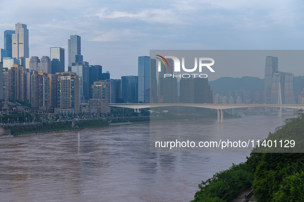 Water levels of the Jialing River and Yangtze River are rising sharply after heavy rainfall in Chongqing, China, on July 11, 2024. It is rep...