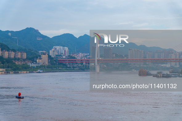 Water levels of the Jialing River and Yangtze River are rising sharply after heavy rainfall in Chongqing, China, on July 11, 2024. It is rep...