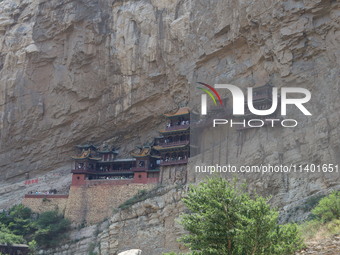 Xuankong Temple is hanging on Hengshan Mountain in Datong City, Shanxi Province, China, on June 23, 2023. (