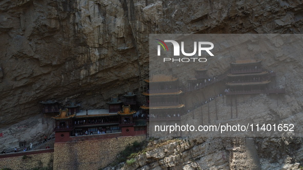 Xuankong Temple is hanging on Hengshan Mountain in Datong City, Shanxi Province, China, on June 23, 2023. 