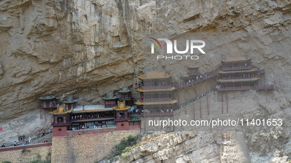 Xuankong Temple is hanging on Hengshan Mountain in Datong City, Shanxi Province, China, on June 23, 2023. 