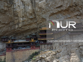 Xuankong Temple is hanging on Hengshan Mountain in Datong City, Shanxi Province, China, on June 23, 2023. (