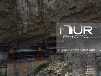 Xuankong Temple is hanging on Hengshan Mountain in Datong City, Shanxi Province, China, on June 23, 2023. (