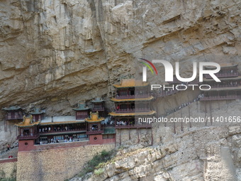 Xuankong Temple is hanging on Hengshan Mountain in Datong City, Shanxi Province, China, on June 23, 2023. (